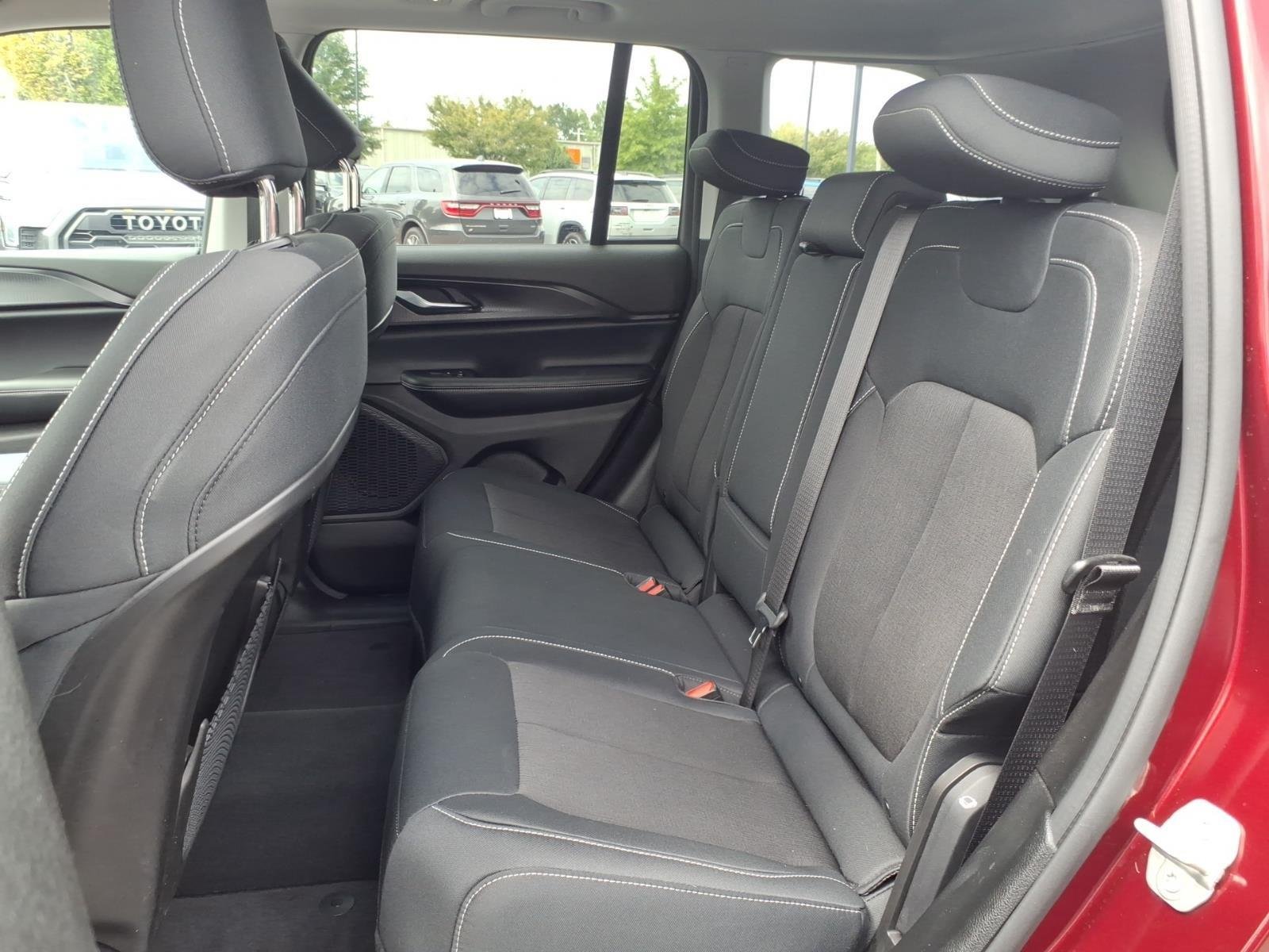 Used 2023 Velvet Red Pearlcoat Jeep Laredo image 19