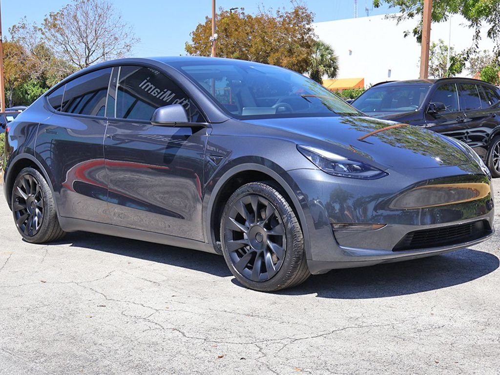 Used 2024 Tesla Model Y Long Range with VIN 7SAYGAEE1RF014919 for sale in Miami, FL