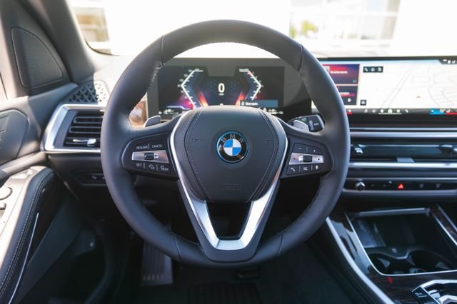 New 2026 Tanzanite Blue II Metallic BMW xDrive50e image 16