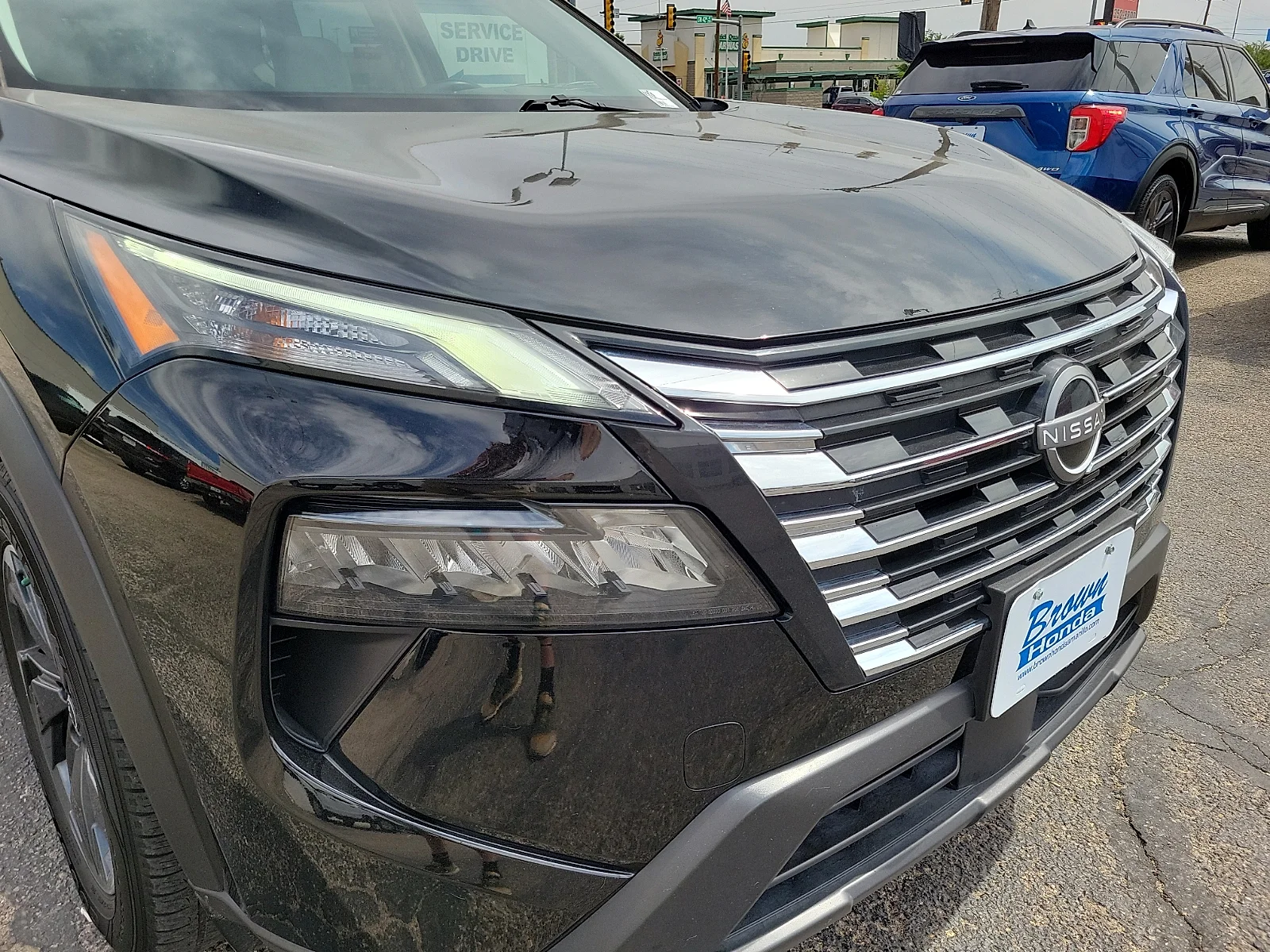 Certified Used 2025 Super Black Nissan SV Intelligent AWD image 13