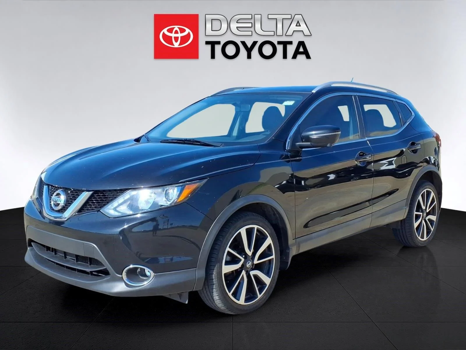 Used 2017 Magnetic Black Nissan SL image 1