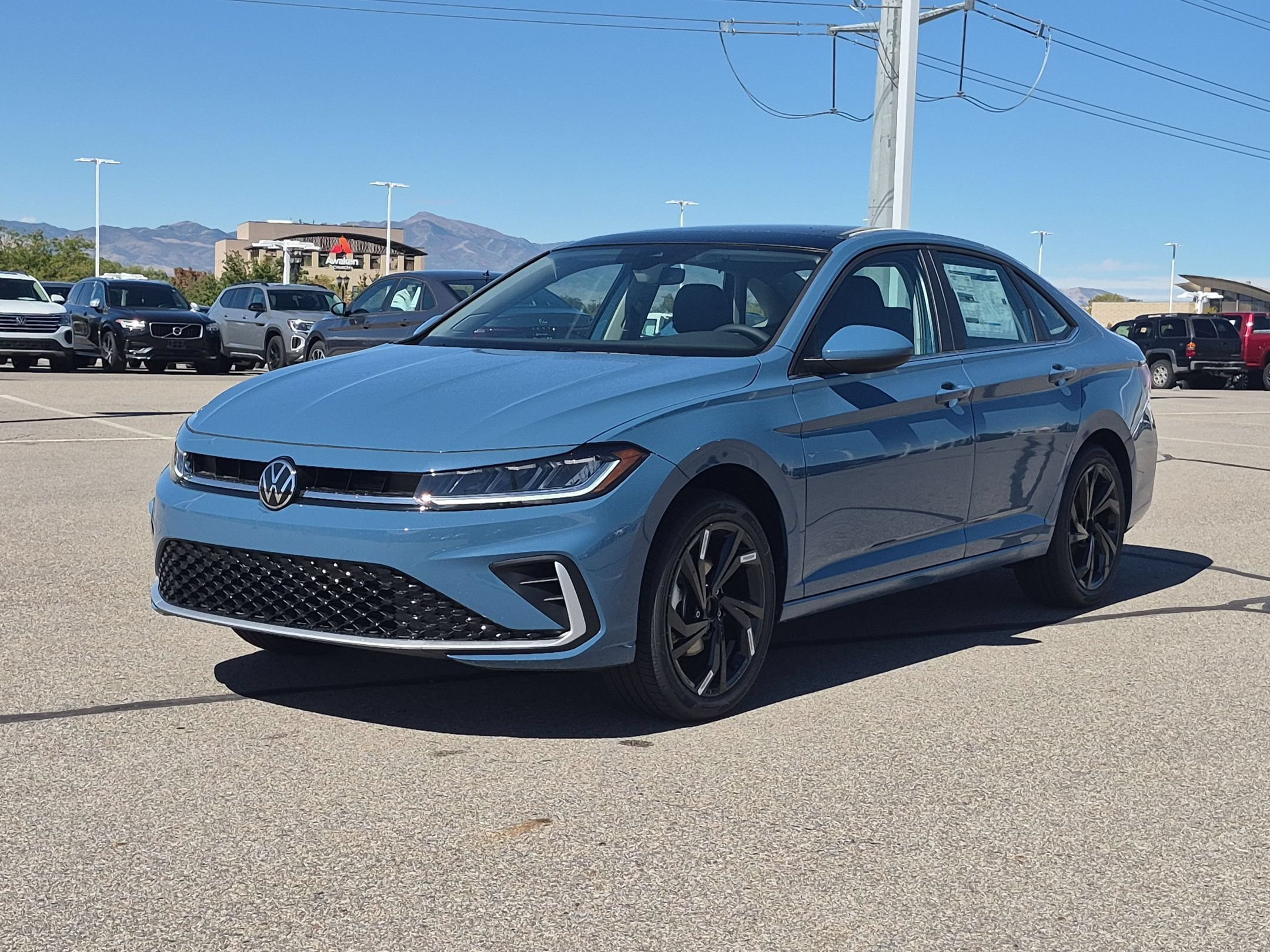 New 2027 Monterey Blue Pearl Volkswagen SE image 8