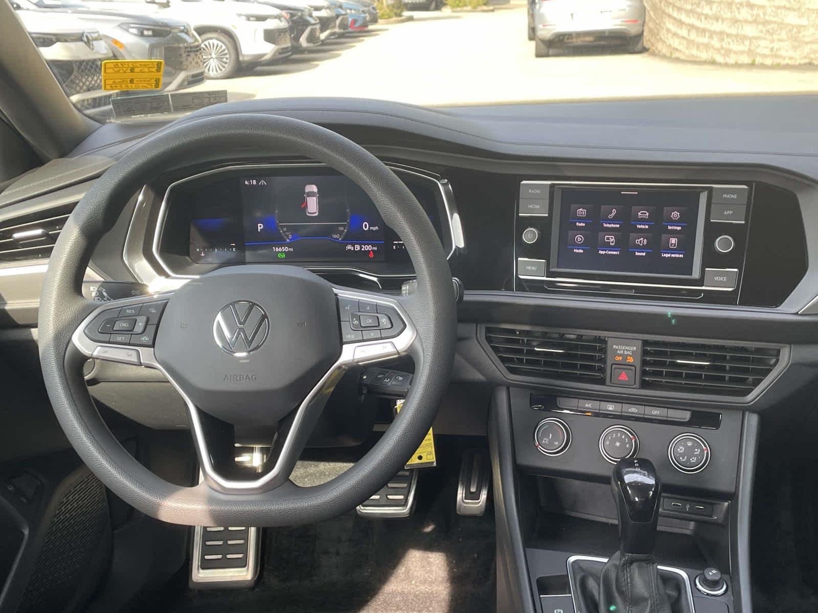 Certified Used 2023 Deep Black Pearl Volkswagen Sport image 2