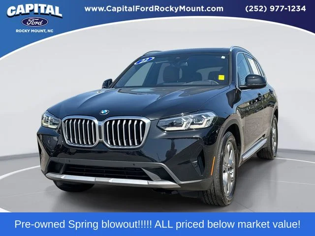 Used 2022 Black BMW sDrive30i image 1