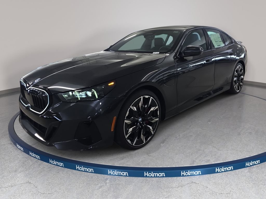 New 2027 Dark Graphite Metallic BMW 550e xDrive image 1