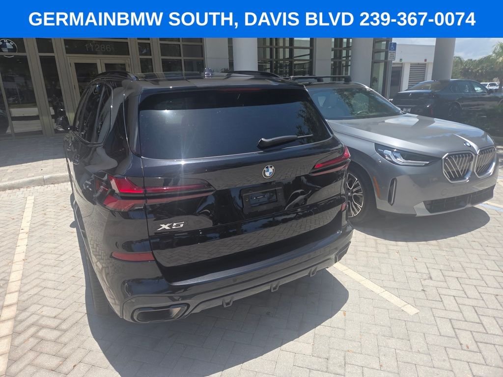 Certified Used 2026 Black Sapphire Metallic BMW sDrive40i image 14
