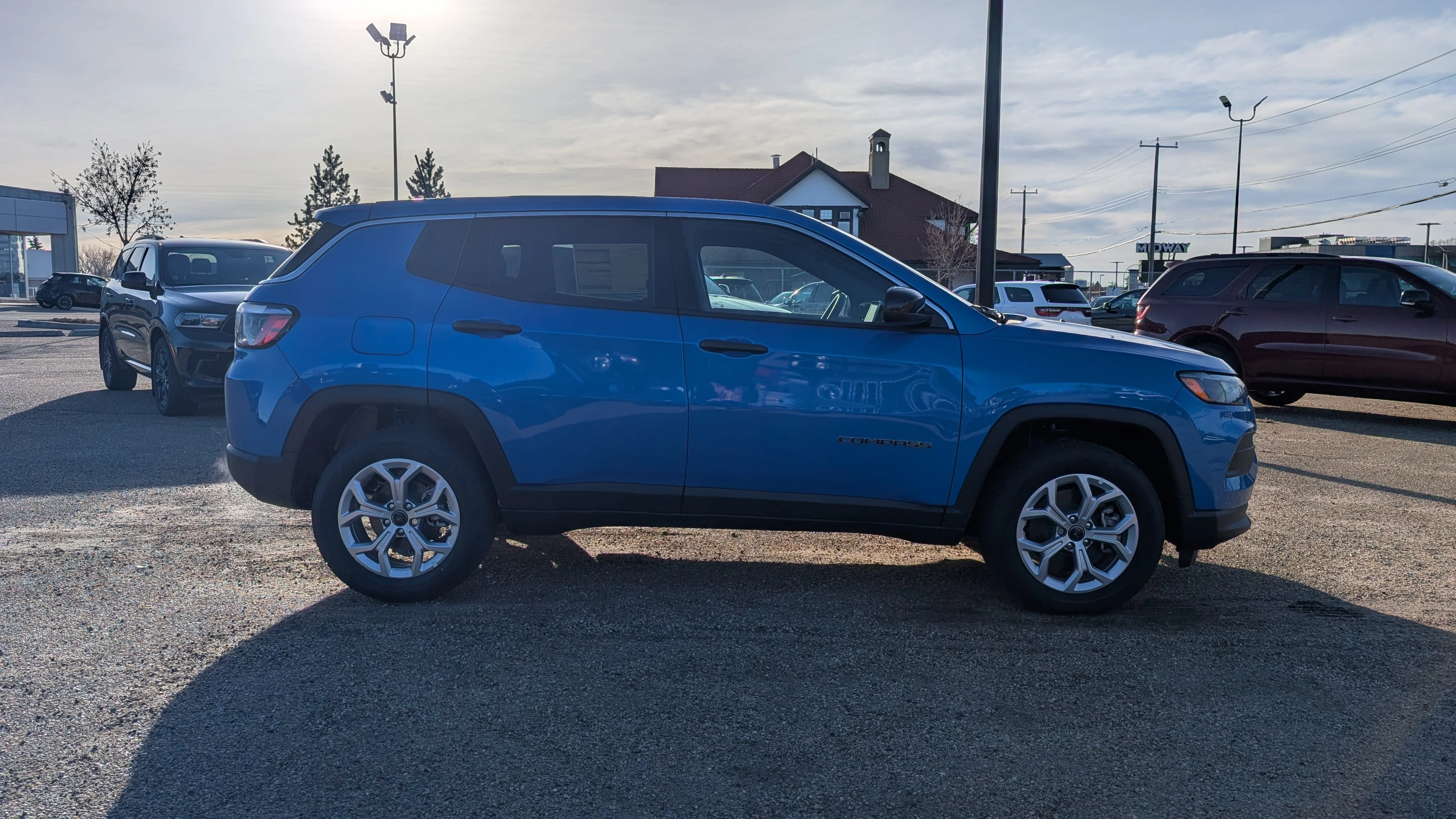 New 2026 Laser Blue Pearl Jeep Sport image 8