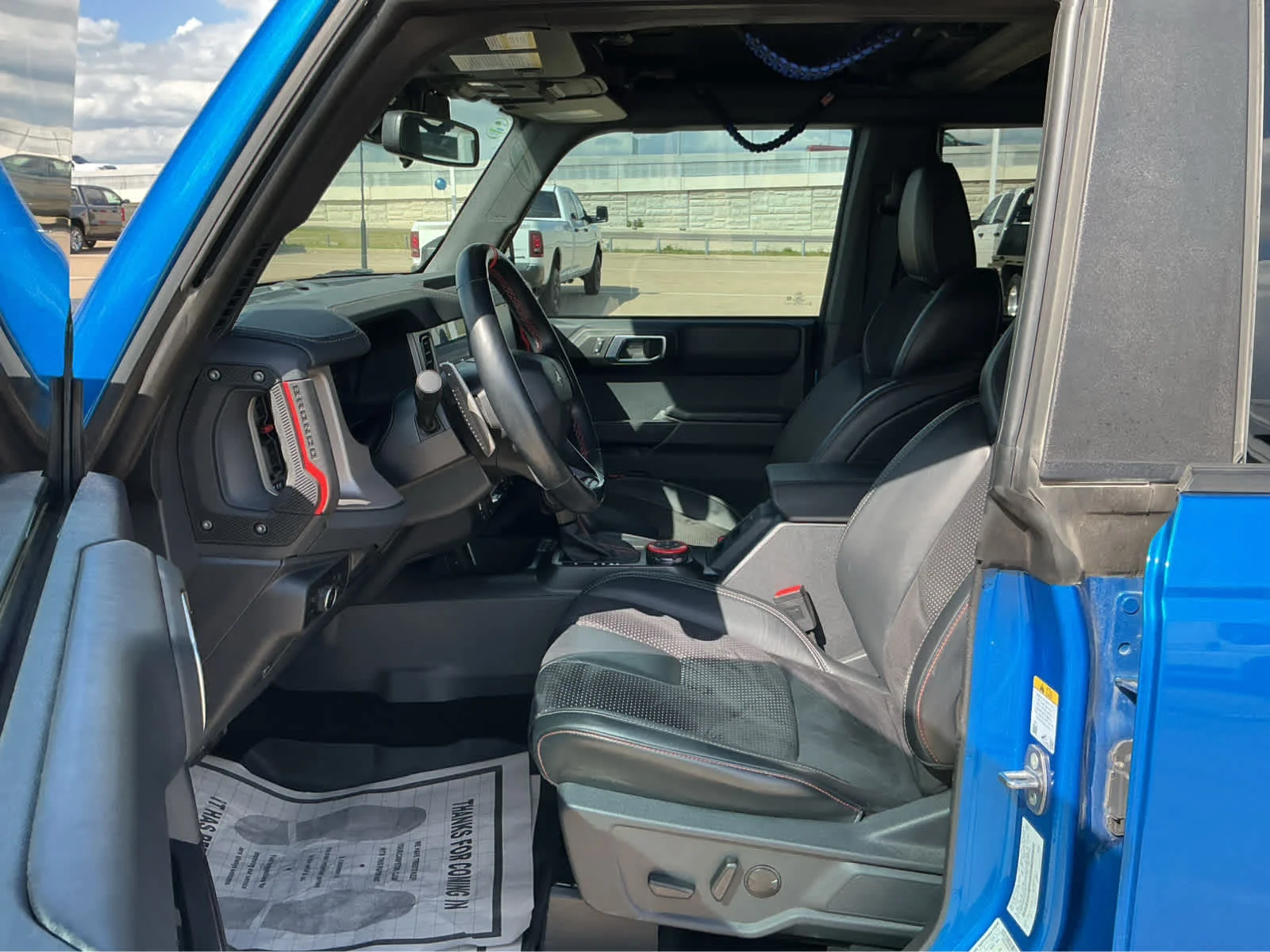 Used 2024 Velocity Blue Metallic Ford Raptor image 12