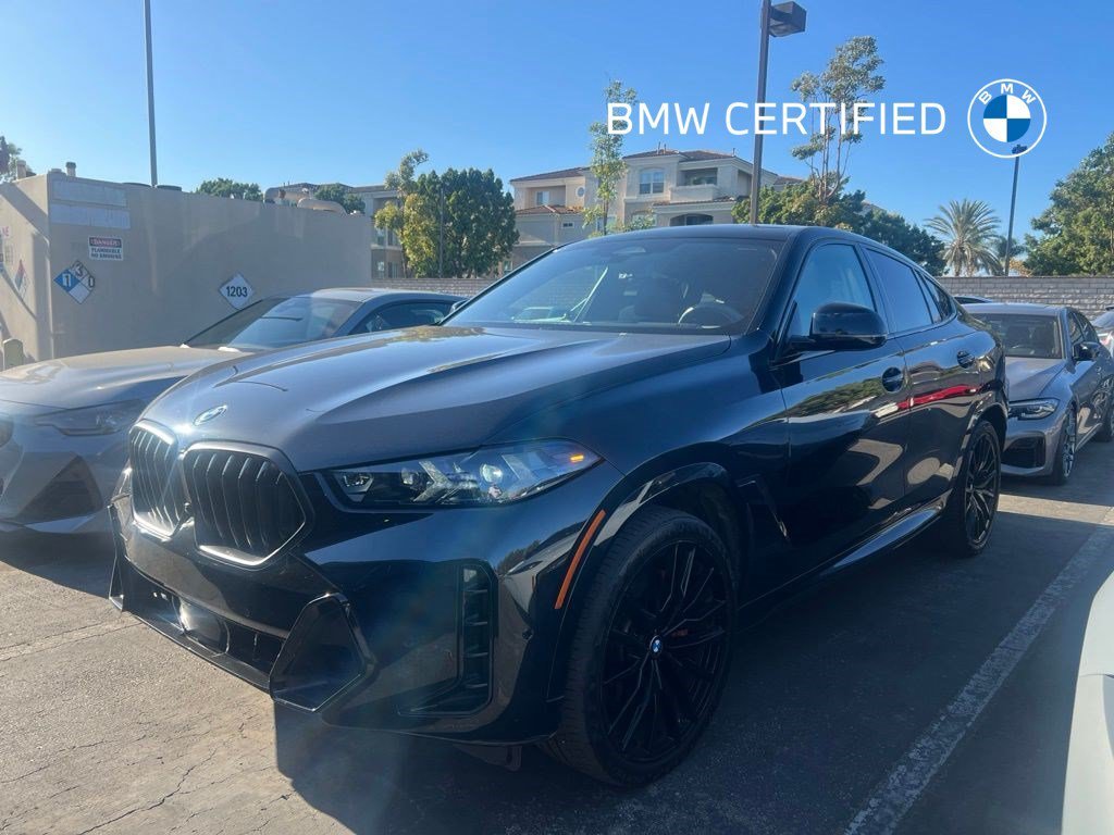 Used 2024 Black Sapphire Metallic BMW xDrive40i image 1