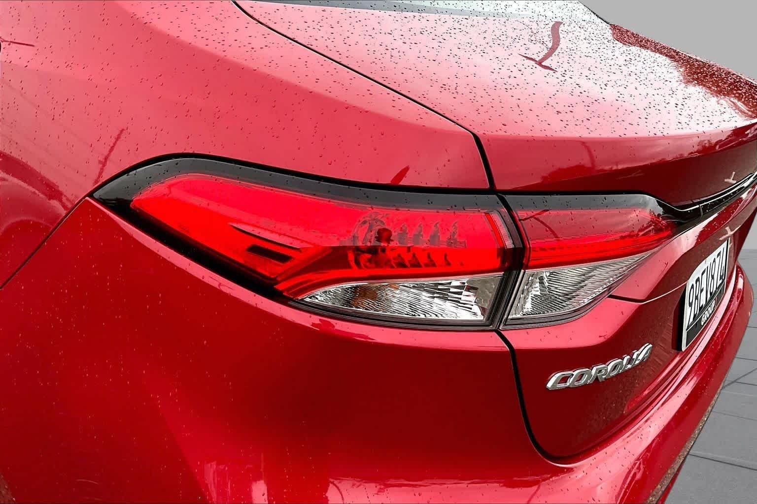 Used 2020 Barcelona Red Metallic Toyota LE image 28