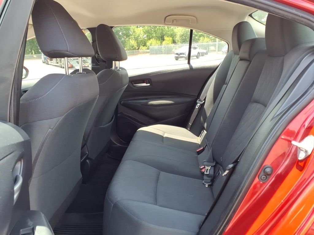 Used 2020 Barcelona Red Metallic Toyota LE image 4