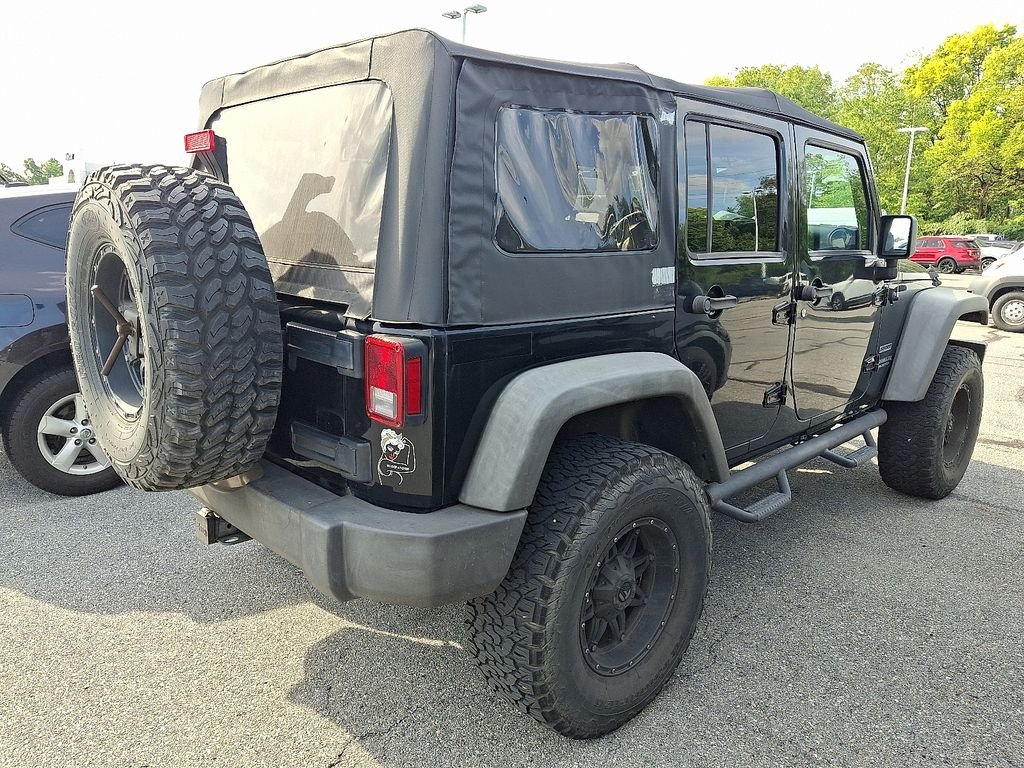 Used 2015 Black Jeep Unlimited Sport image 6