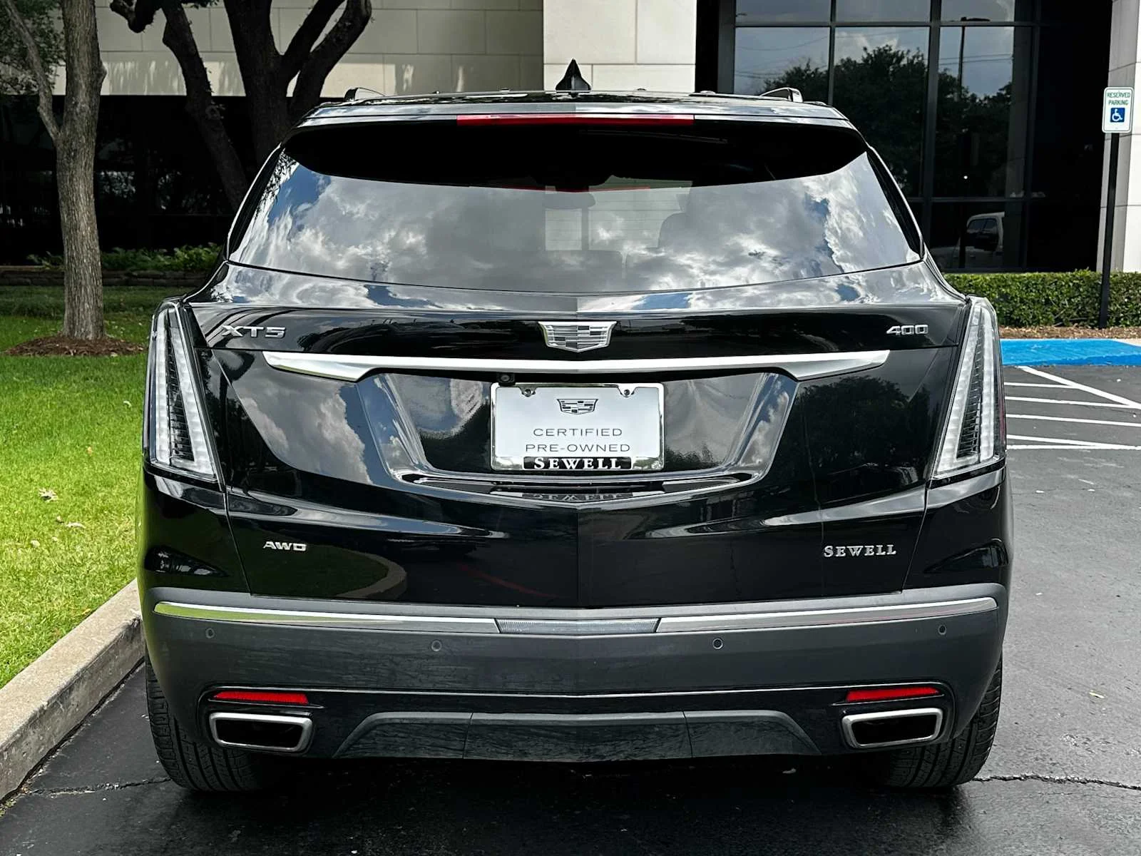 Certified Used 2024 Stellar Black Metallic Cadillac Sport image 3