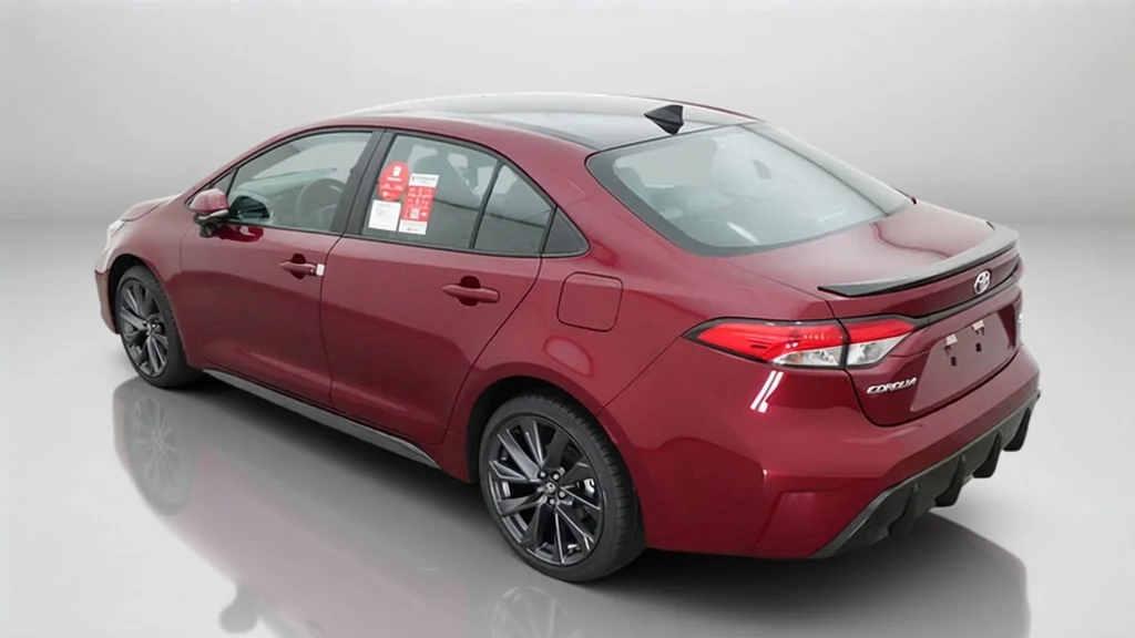 New 2027 Ruby Flare Pearl with Inked roof Toyota SE image 14