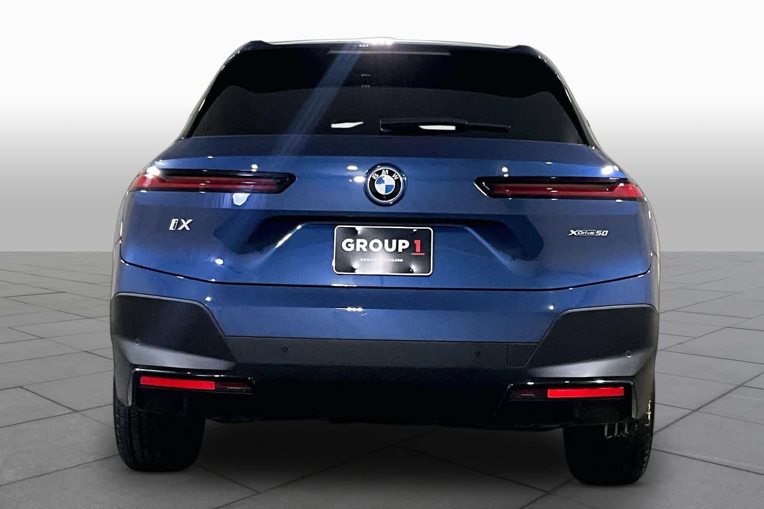 Used 2024 Phytonic Blue Metallic BMW xDrive50 image 4