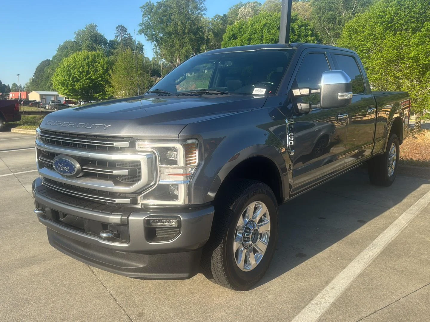 Used 2022 Carbonized Gray Metallic Ford Platinum image 1