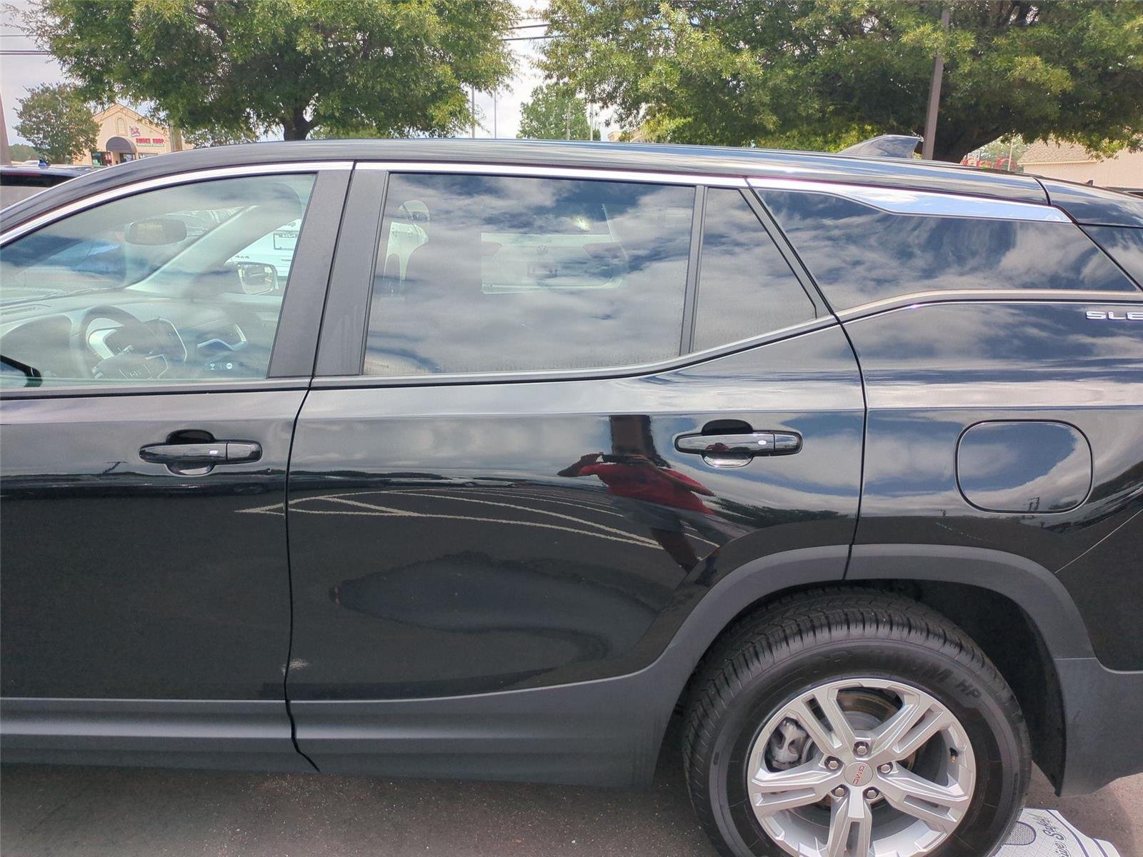 Used 2024 Ebony Twilight Metallic GMC SLE image 30