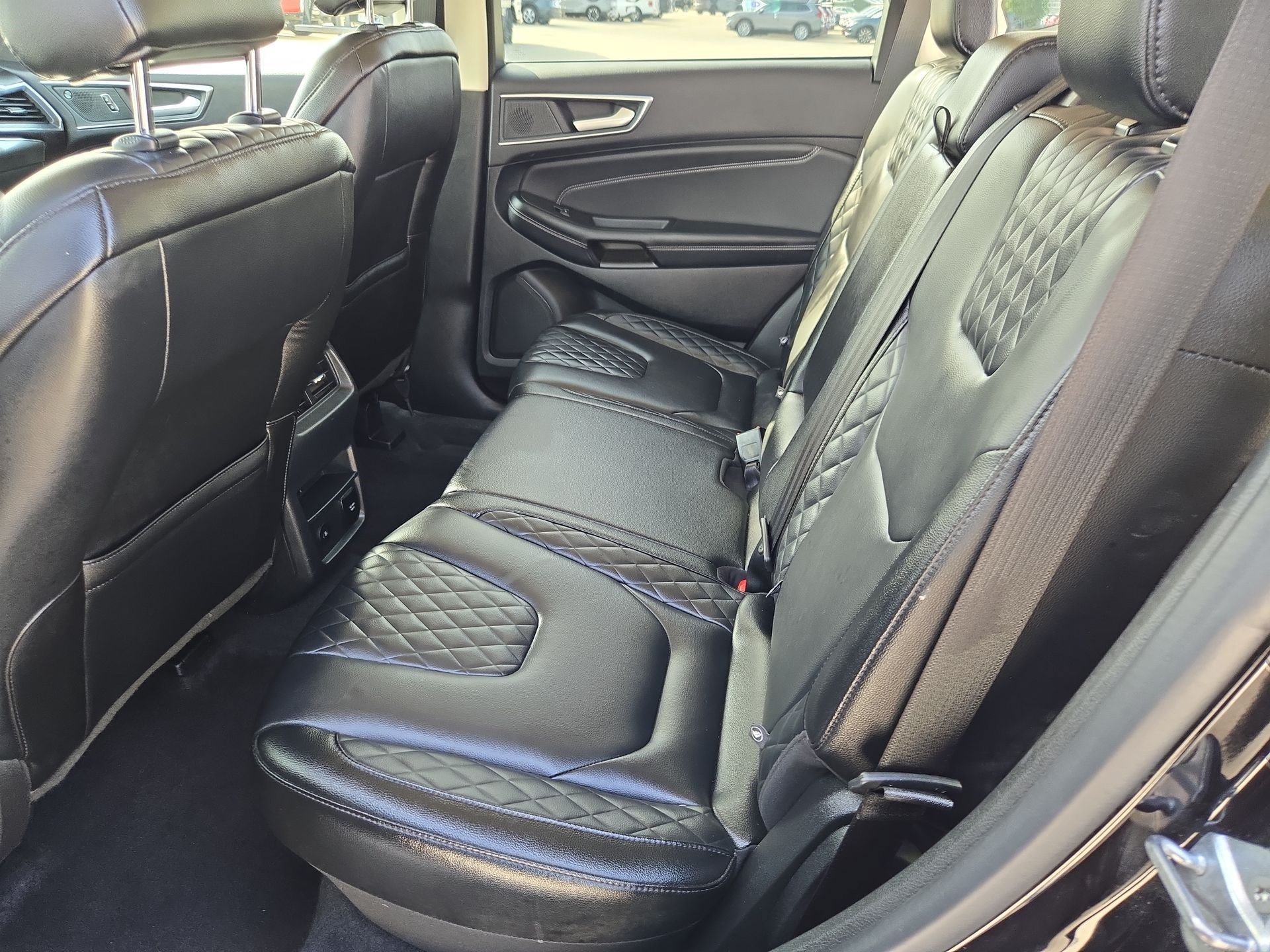 Used 2024 Black Metallic Ford Titanium image 25