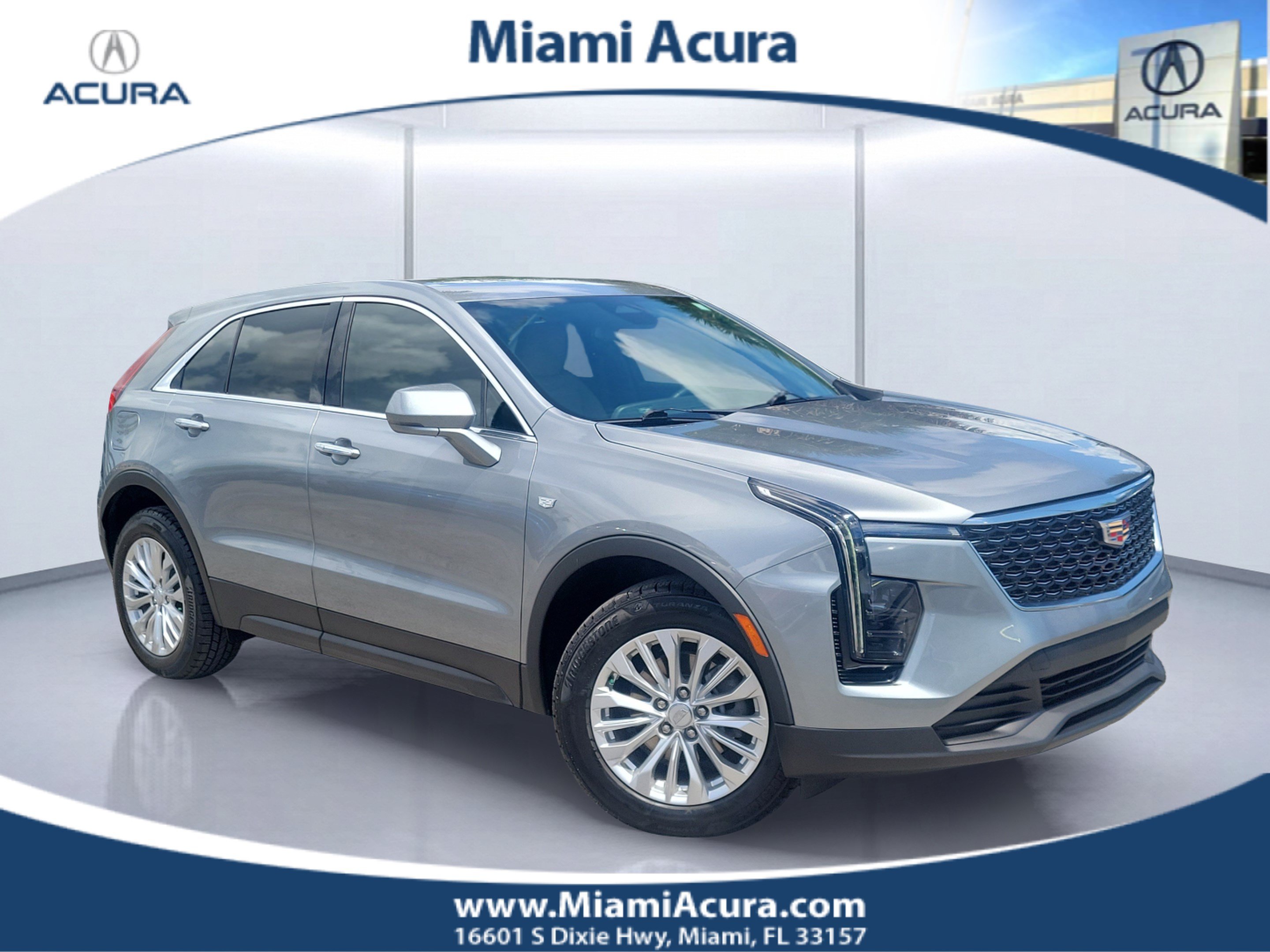 Used 2024 Argent Silver Metallic Cadillac Luxury image 1