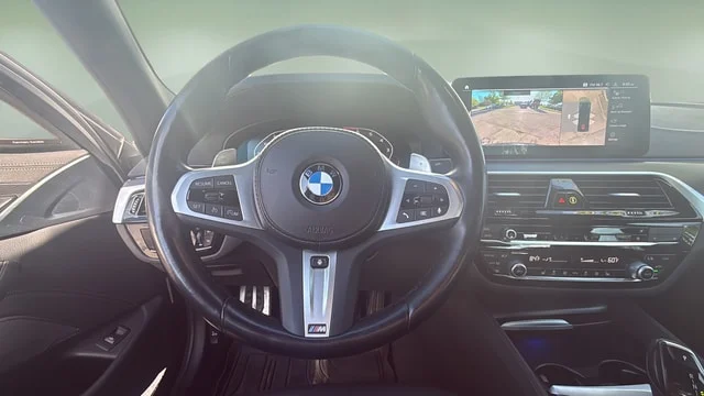 Used 2023 Black Sapphire Metallic BMW M550i xDrive image 9