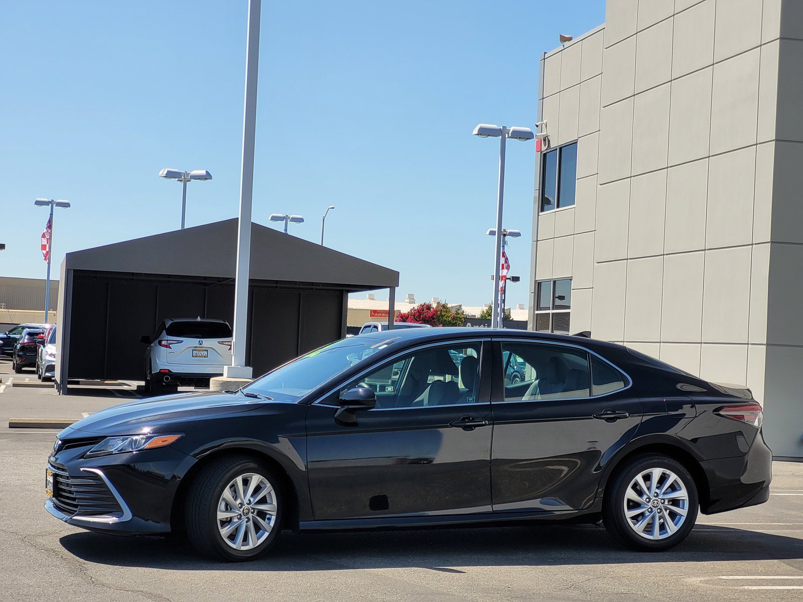 Used 2024 Black Toyota LE image 7