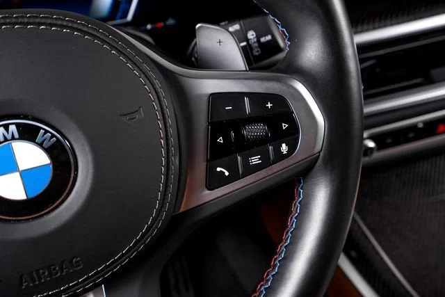 Used 2025 Black Sapphire Metallic BMW M60i image 44