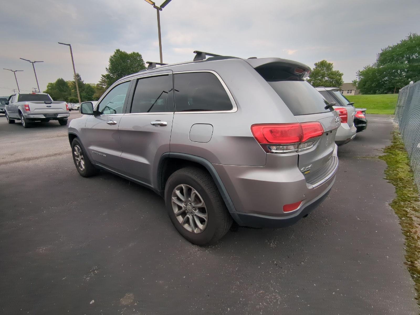 Used 2014 Billet Silver Metallic Clearcoat Jeep Limited image 5