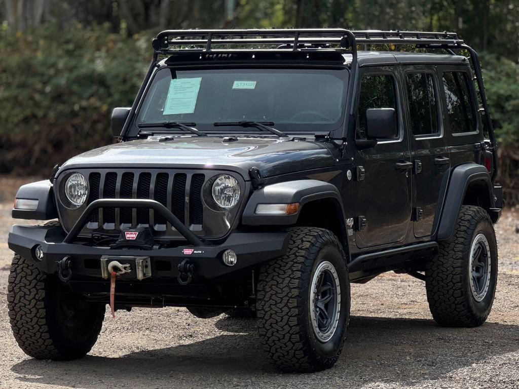 Used 2018 Granite Crystal Metallic Clearcoat Jeep Unlimited Sport S image 2