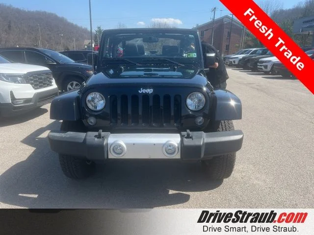 Used 2014 Black Jeep Sahara image 1