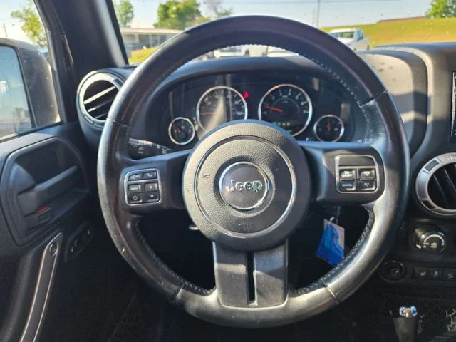 Used 2017 Black Jeep Unlimited Sahara image 14