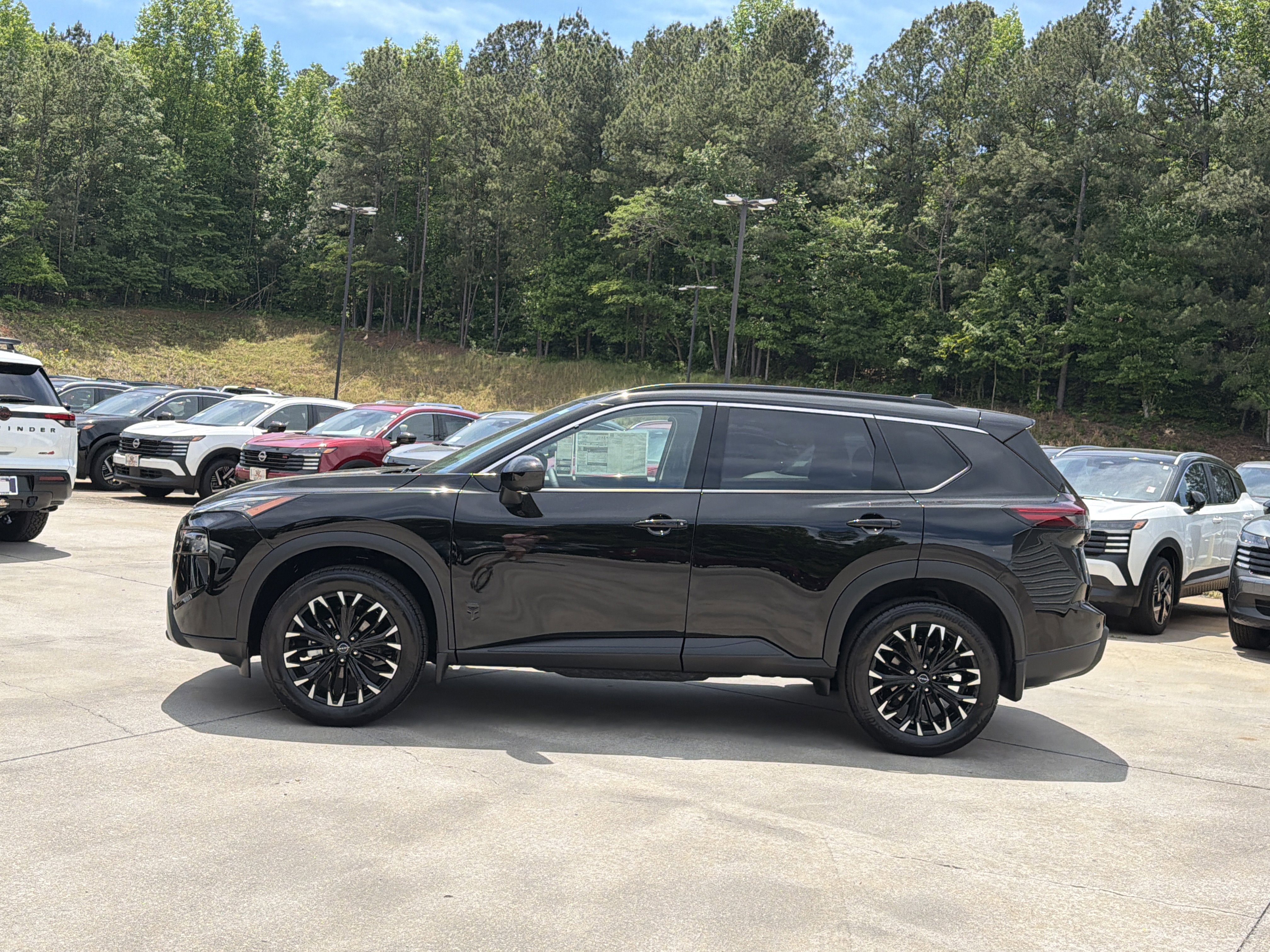 New 2026 Super Black Nissan Dark Armor image 5
