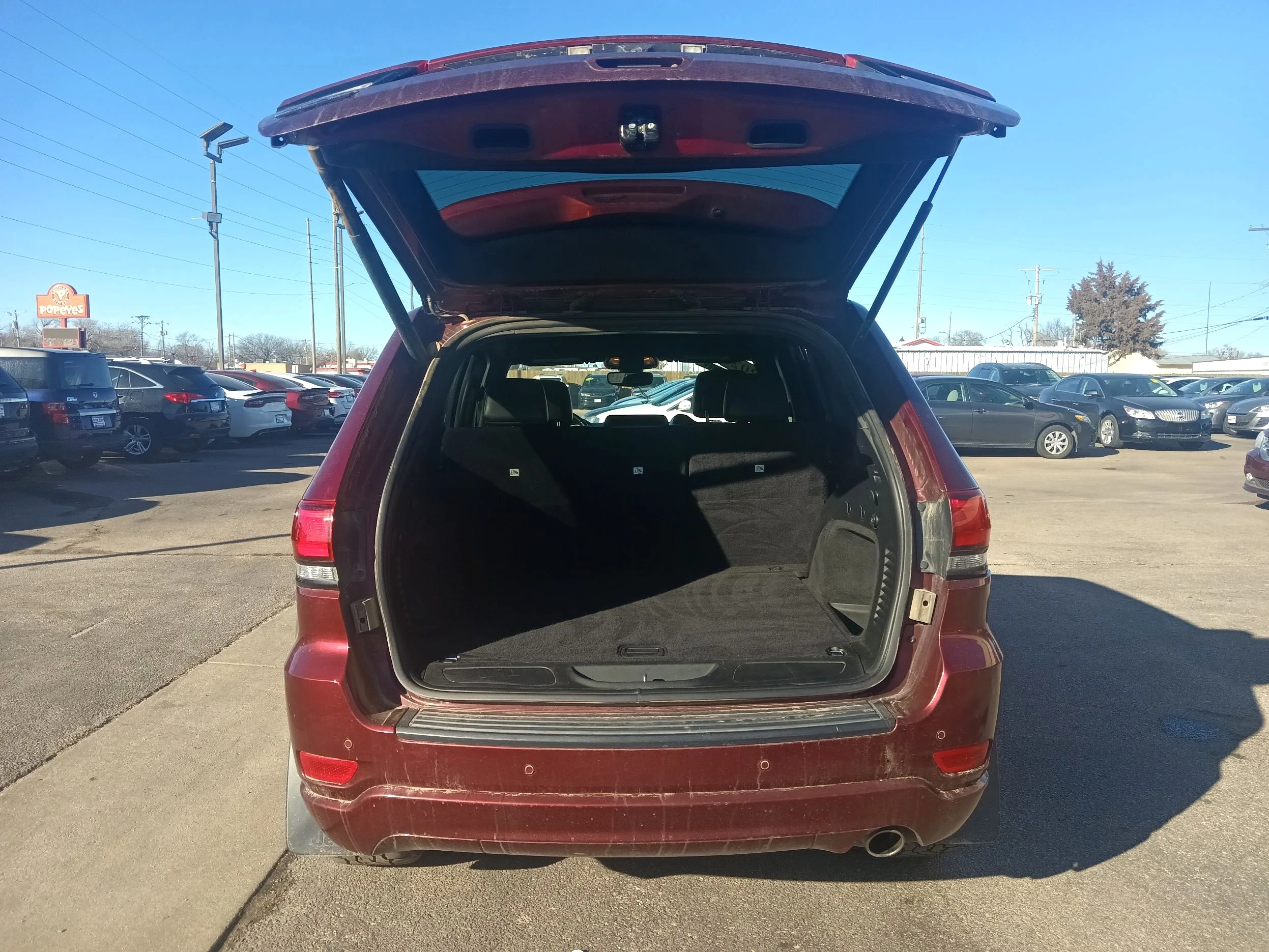 Used 2020 Maroon Jeep Altitude 4X4 image 11