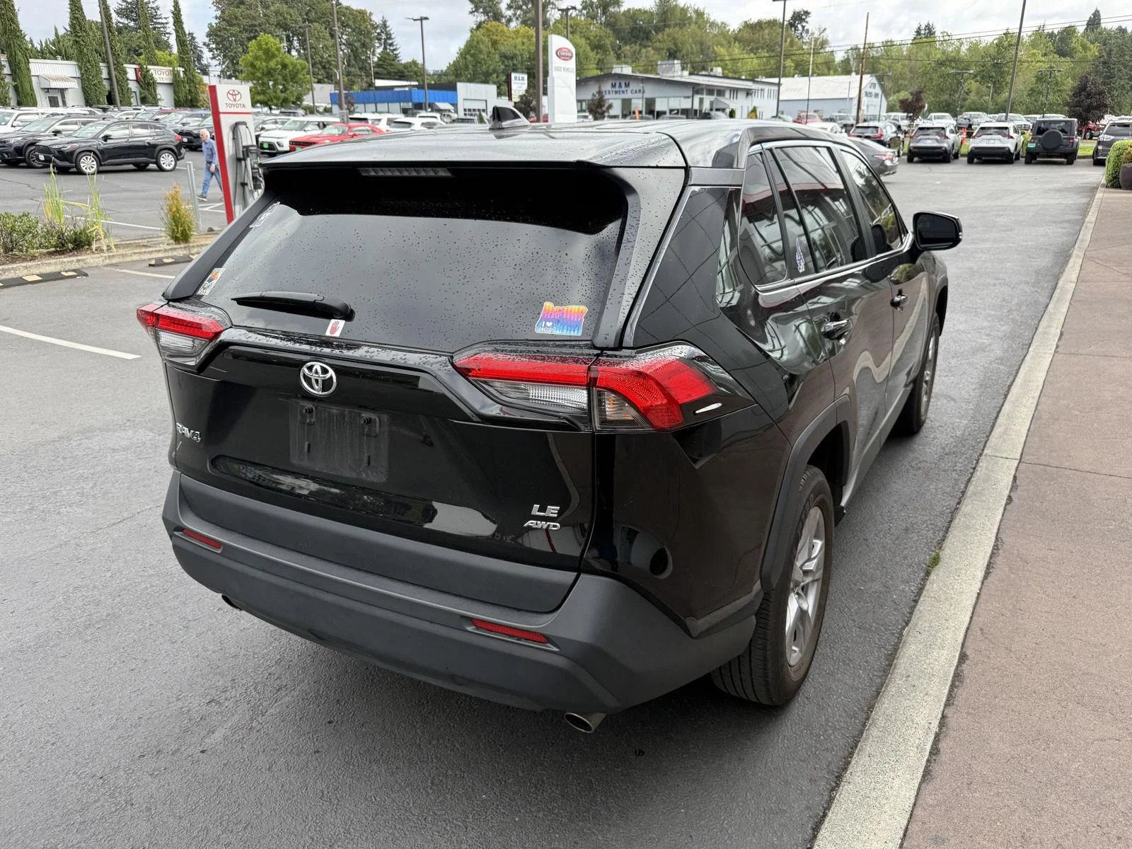 Used 2025 Midnight Black Metallic Toyota LE image 5
