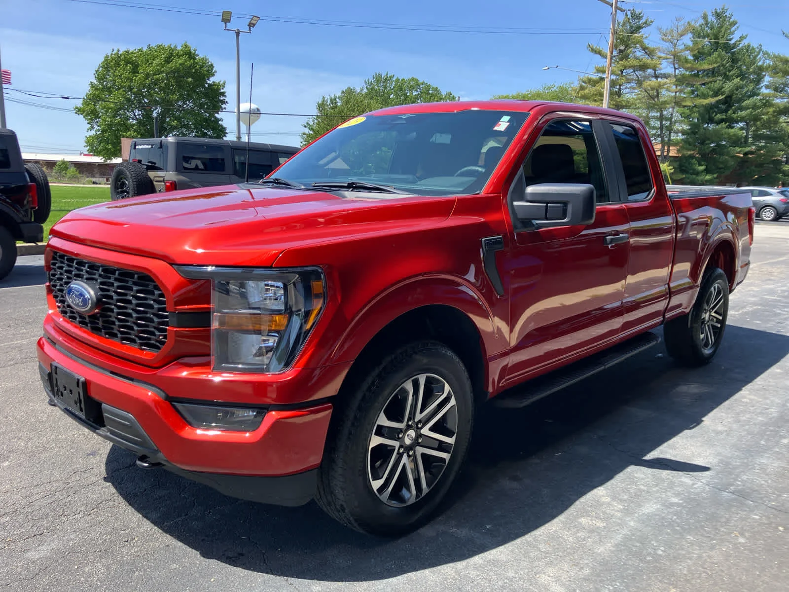Used 2023 Hot Pepper Red Metallic Tinted Clearcoat Ford XL image 4