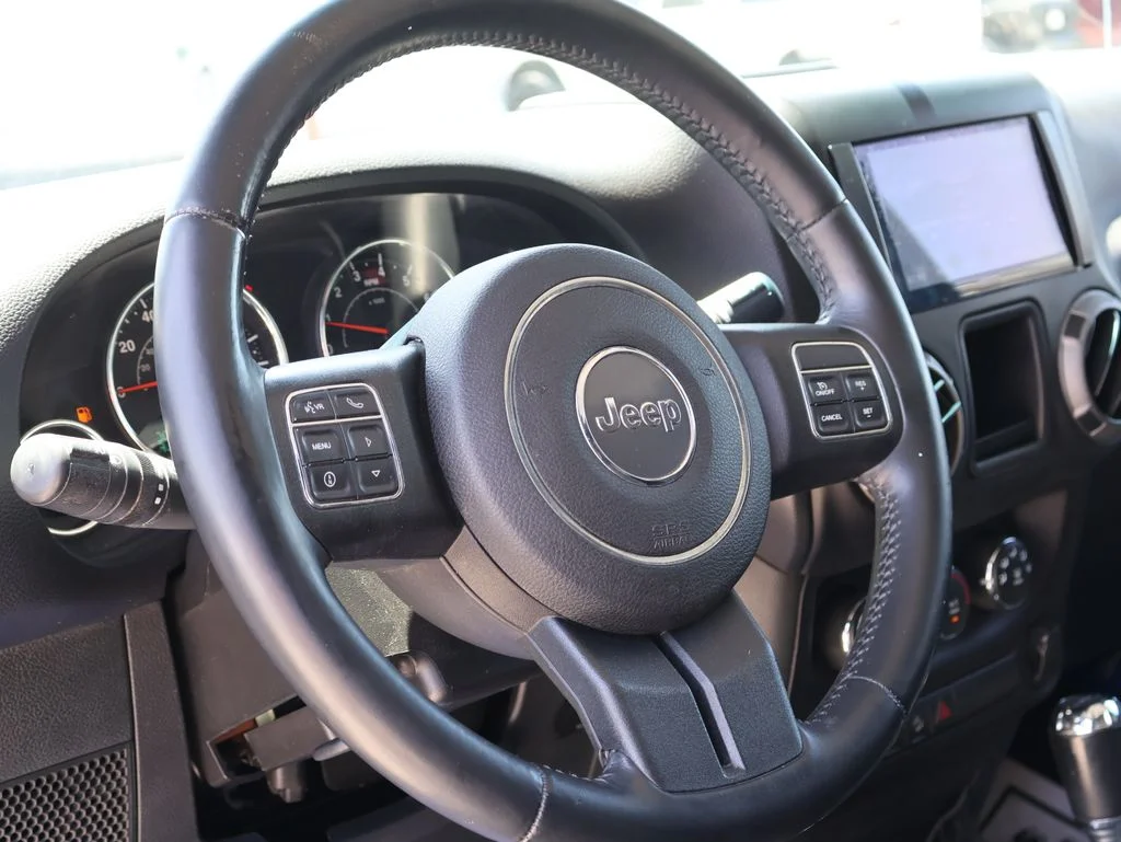 Used 2014 Blue Jeep Unlimited Sport image 24