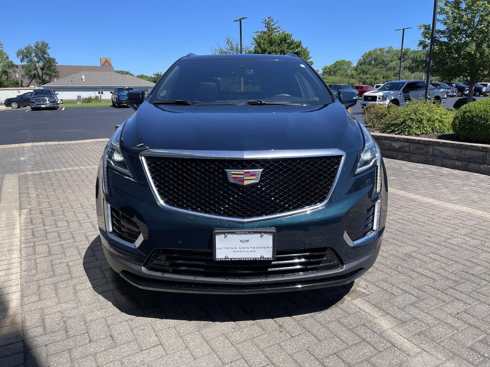 Used 2024 Emerald Lake Metallic Cadillac Sport image 8