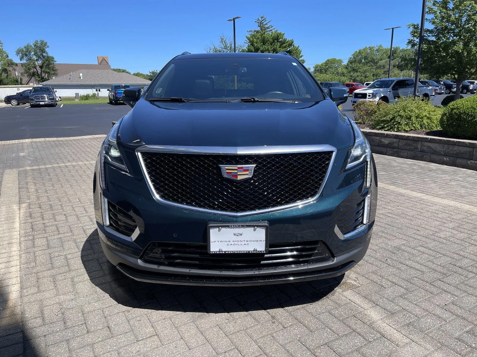 Used 2024 Emerald Lake Metallic Cadillac Sport image 8