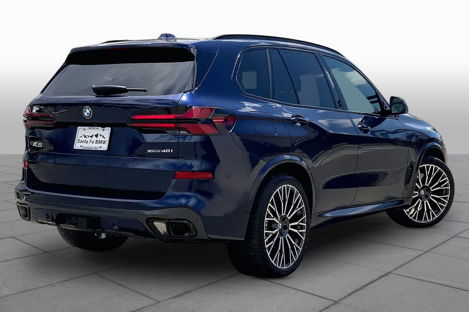 Used 2024 Tanzanite Blue II Metallic BMW xDrive40i image 12