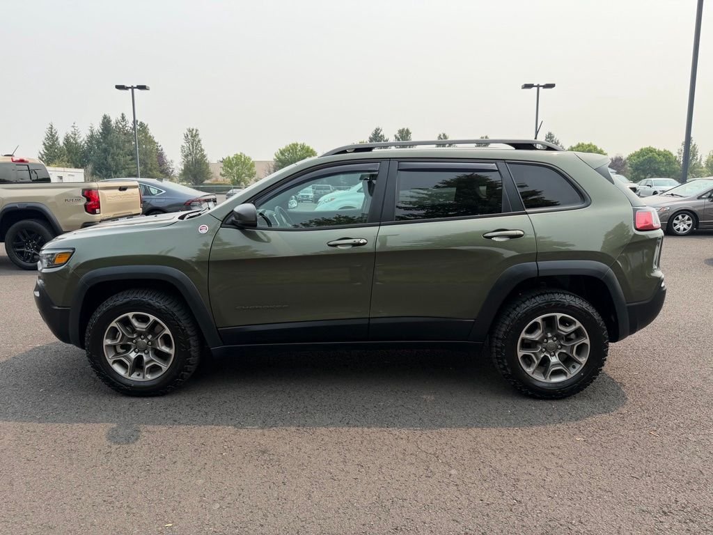 Used 2021 Olive Green Pearlcoat Jeep Trailhawk image 5