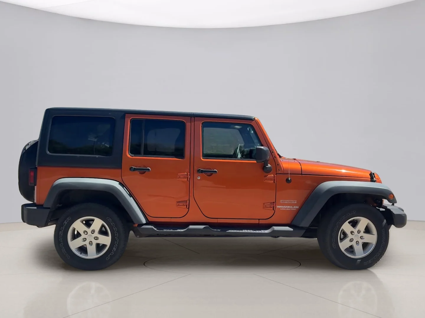 Used 2011 Orange Jeep UNLIMITED image 6