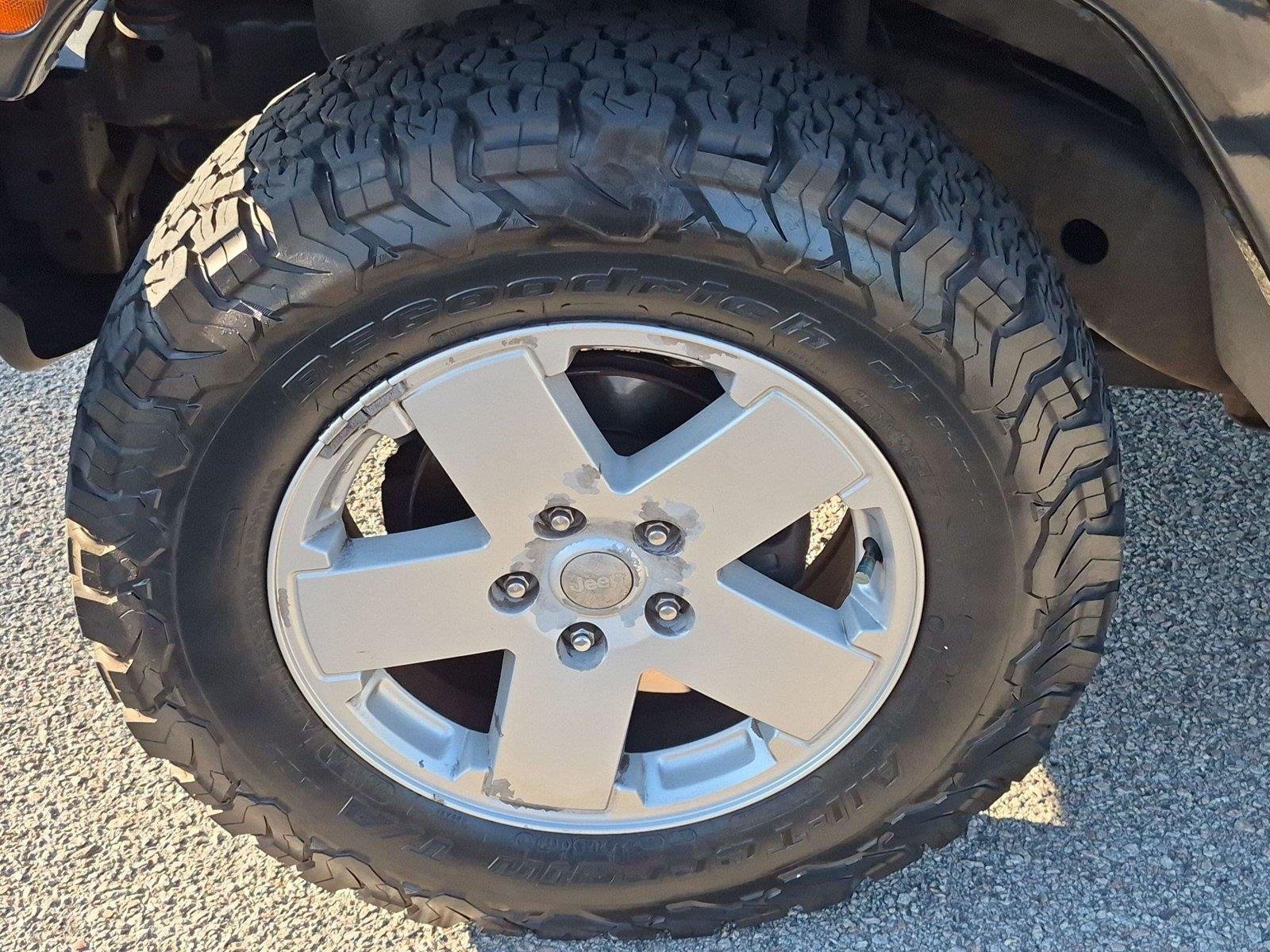 Used 2011 Black Clear Coat Jeep Sahara image 8