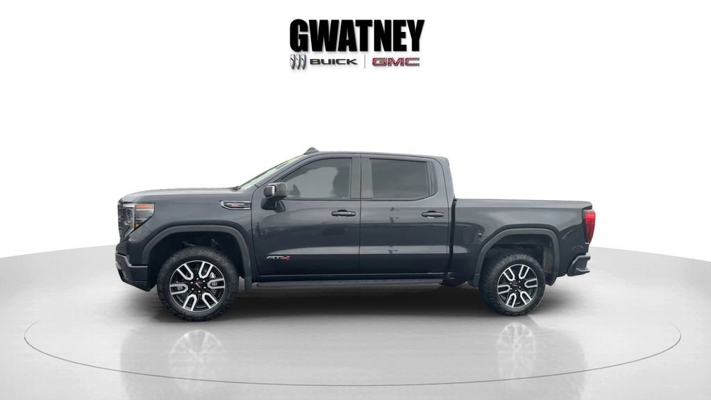 Used 2023 Titanium Rush Metallic GMC AT4 image 6