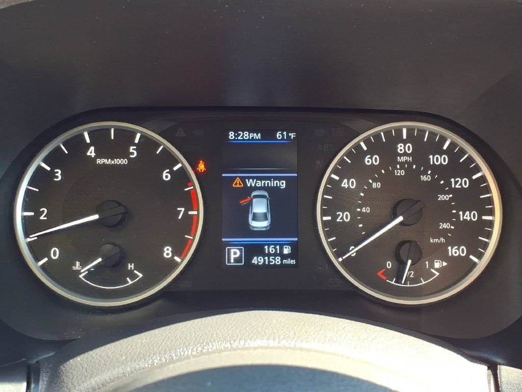 Used 2024 Cloud White Nissan S image 27
