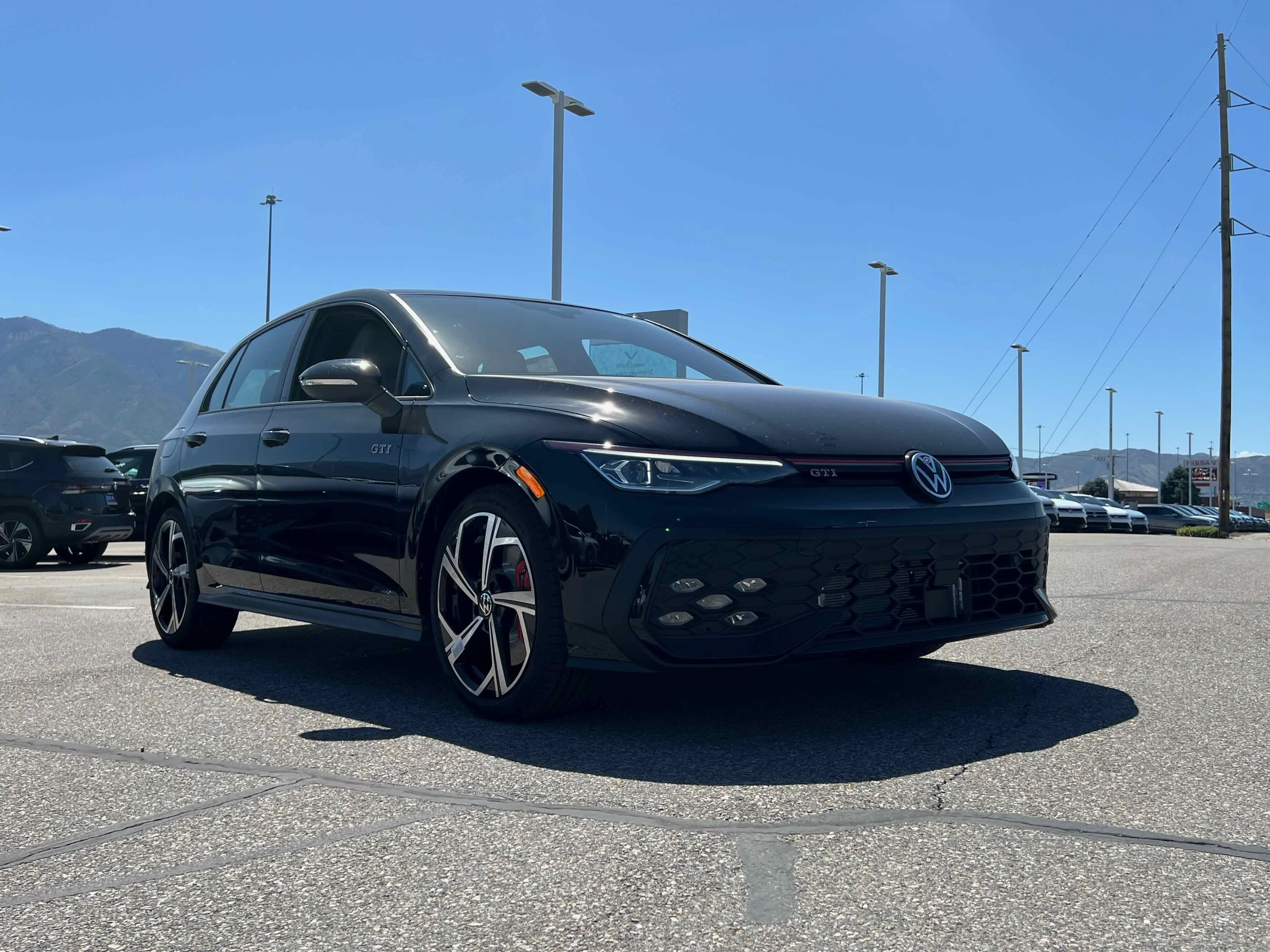 New 2025 Black Volkswagen SE image 9