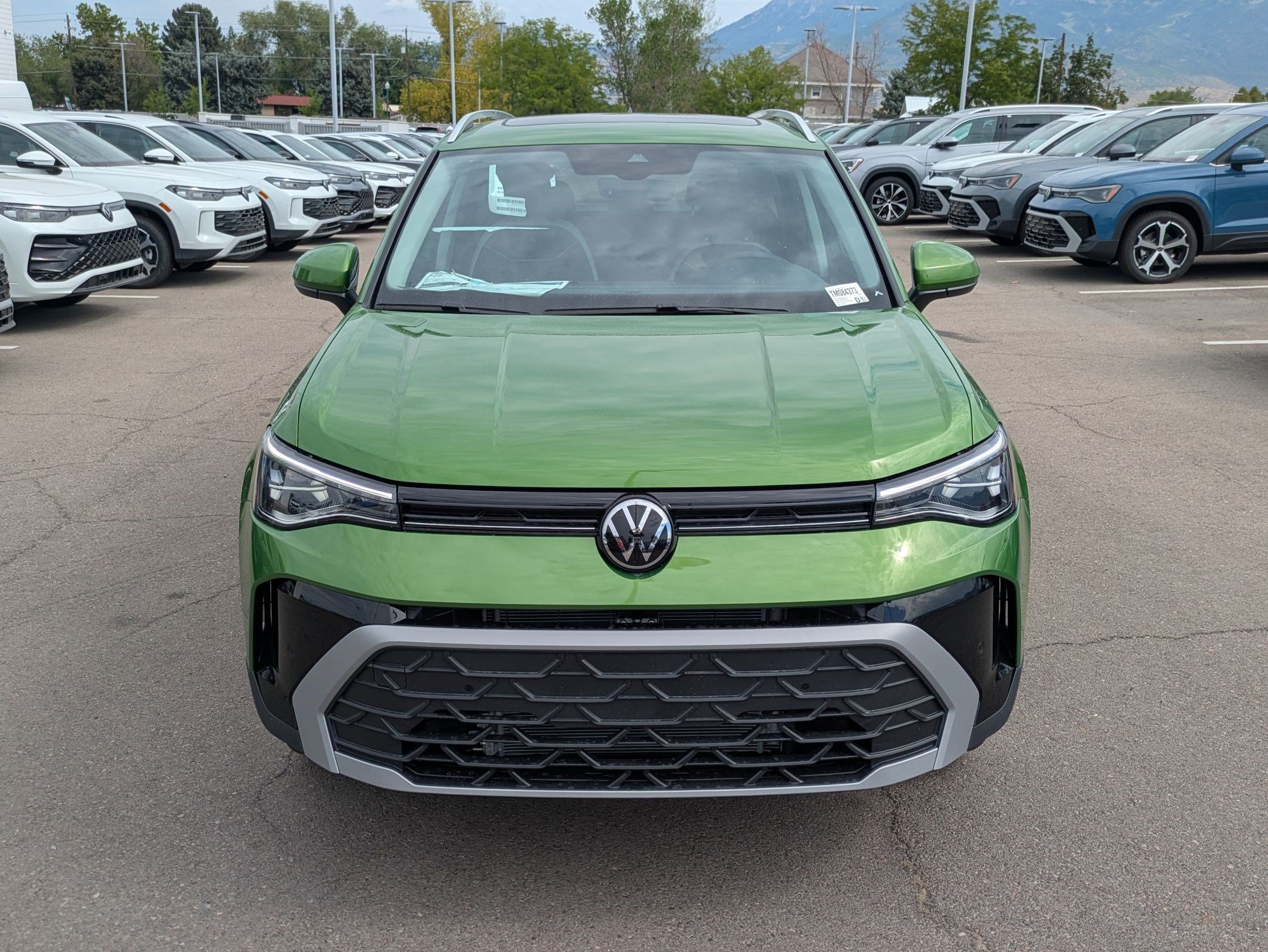New 2026 Bright Moss Green Metallic Volkswagen SE image 9