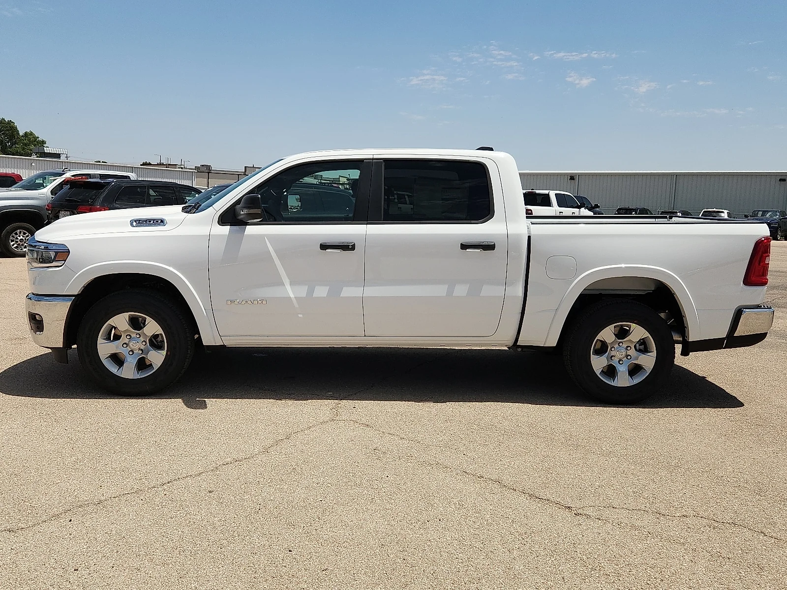 New 2026 Bright White Clear-Coat  Paint Ram LONE STAR CREW CAB 4X2 5