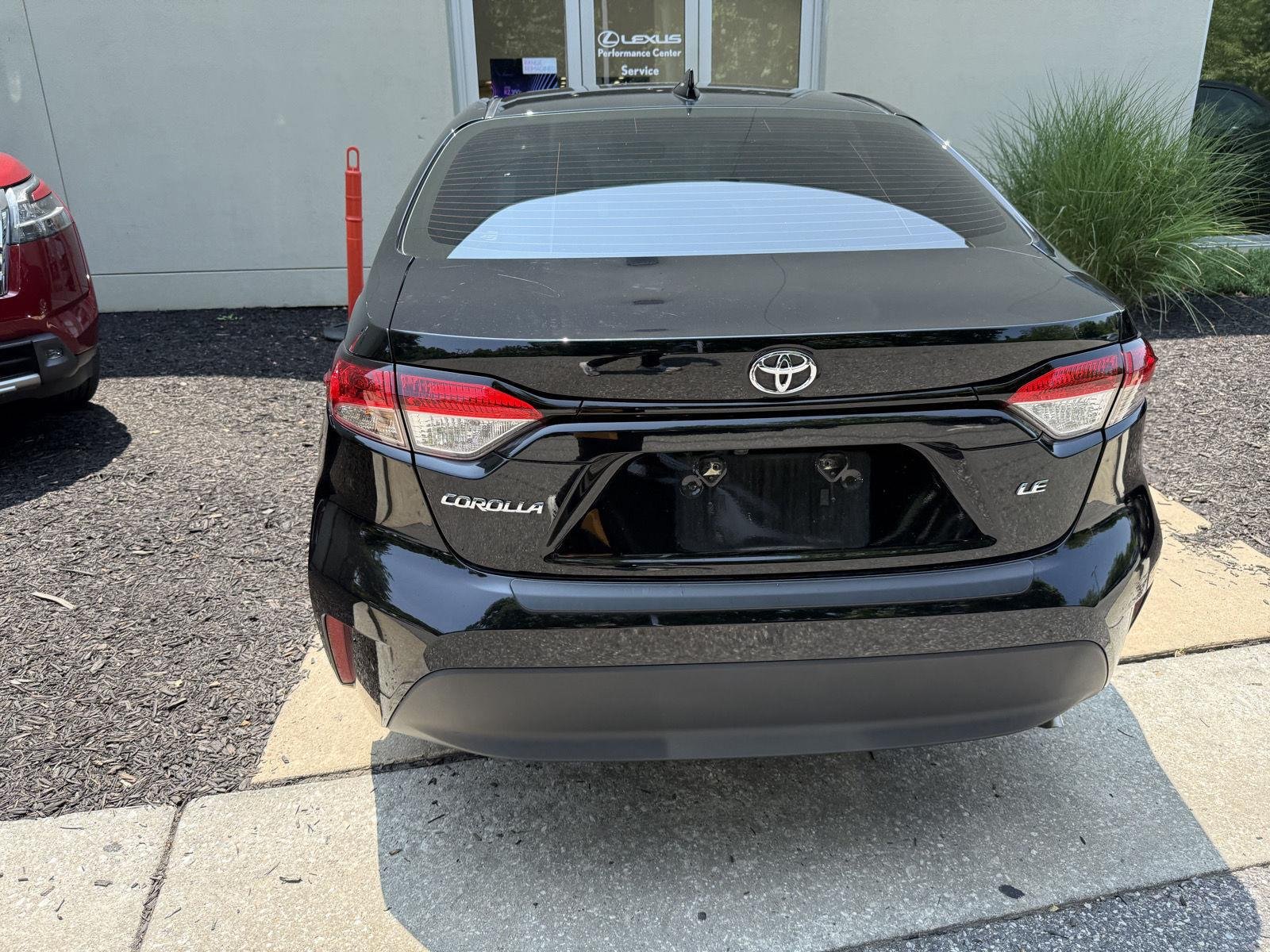 Used 2023 Midnight Black Metallic Toyota LE image 5