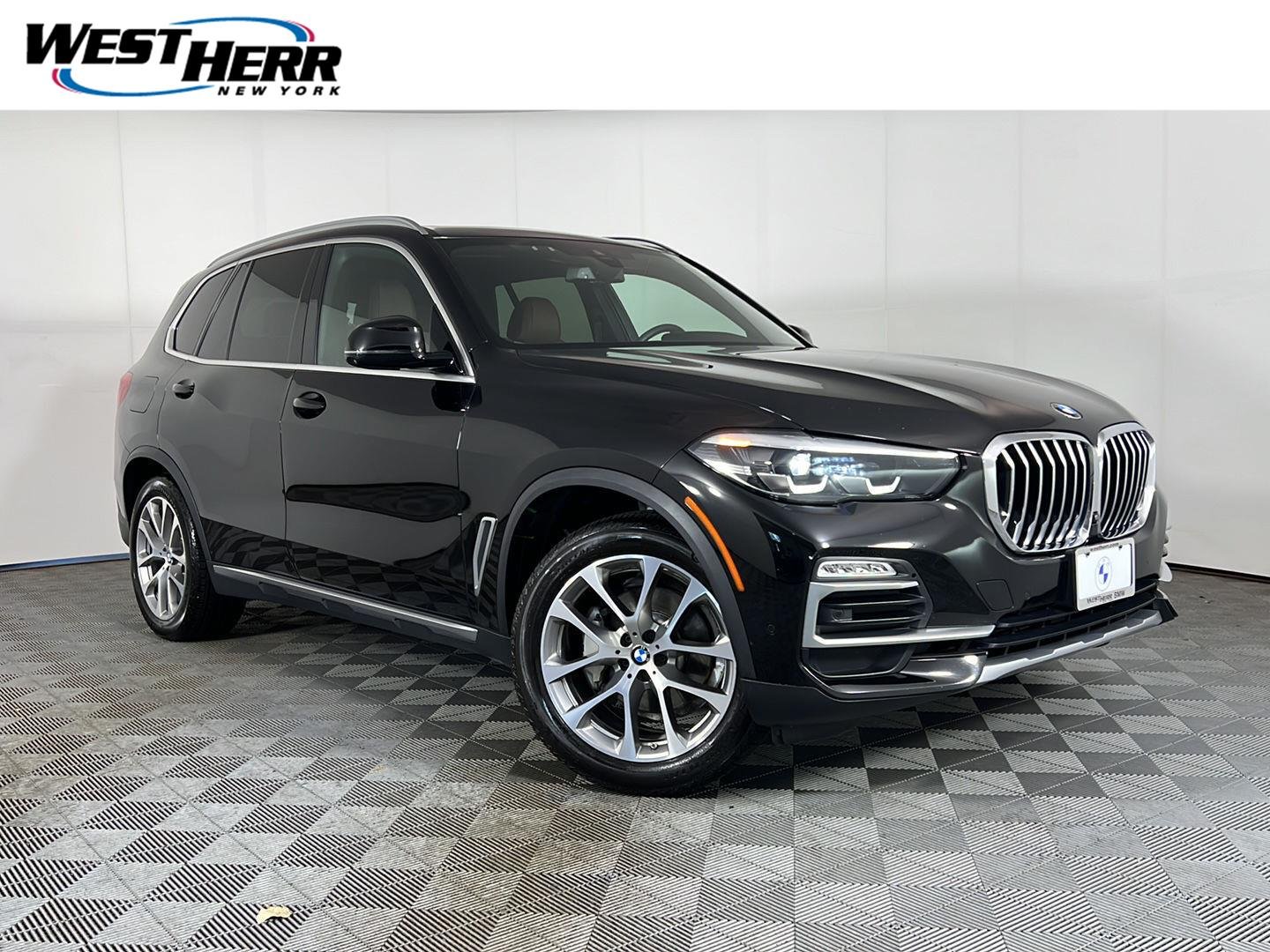 Used 2020 Jet Black BMW xDrive40i image 1