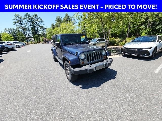 Used 2013 Blue Jeep Unlimited Sport image 3