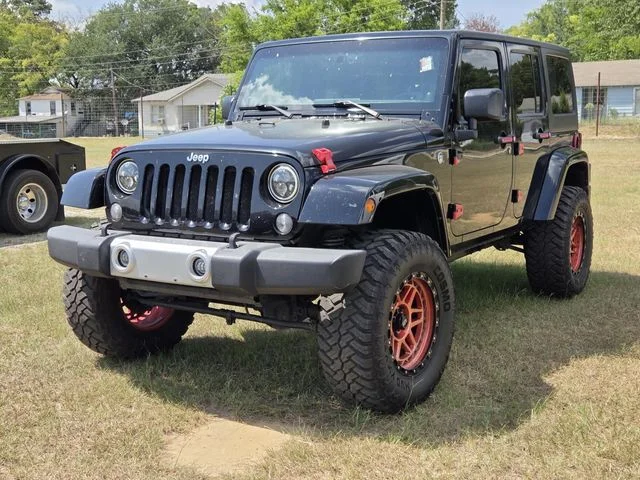 Used 2014 Black Jeep Unlimited Sahara image 3